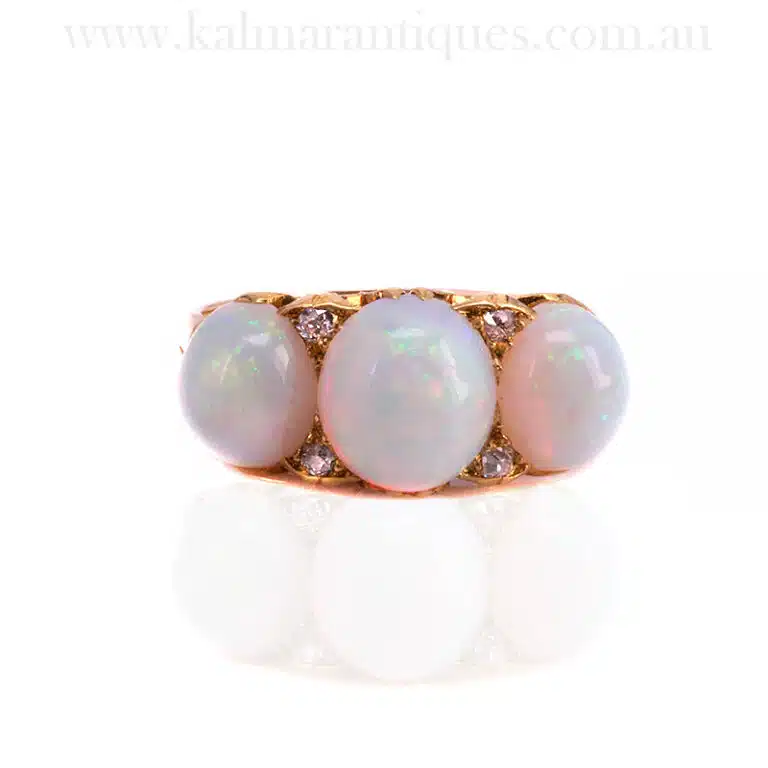 Antique solid opal and diamond ring