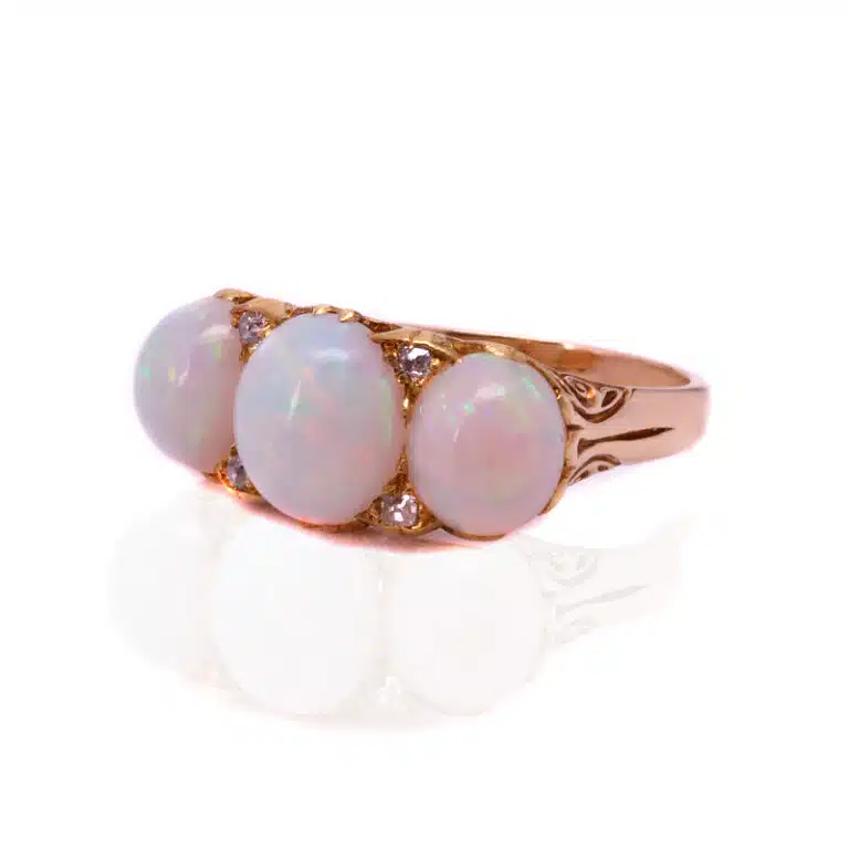 Antique solid opal and diamond ring