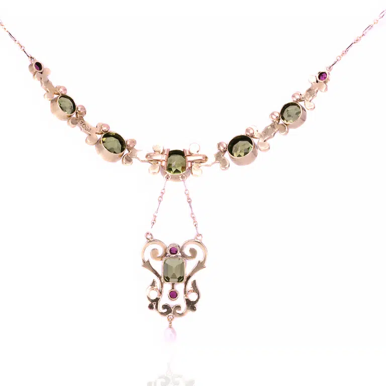 Antique enamel necklace with peridots and rubies