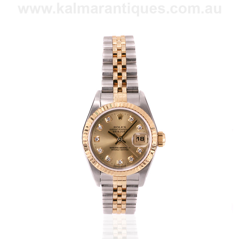 Ladies gold and steel diamond dial 