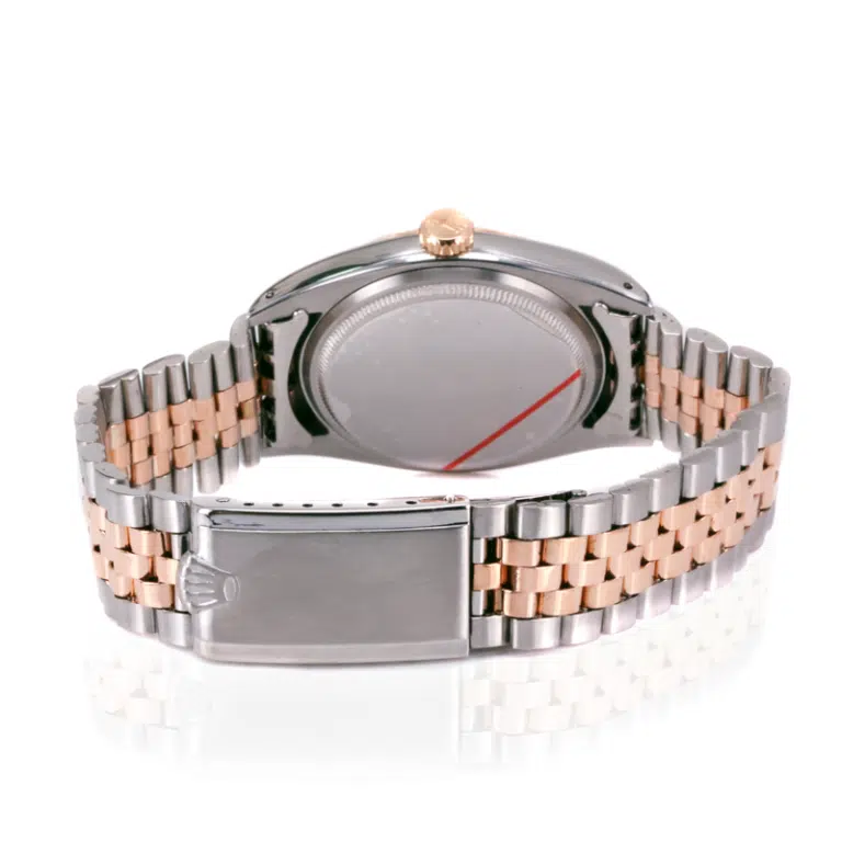 Rare 1957 rose gold and steel Rolex 6605