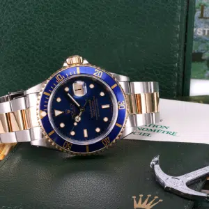 Rolex gold and steel submariner blue dial