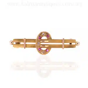 Antique ruby and diamond brooch made in 1896
