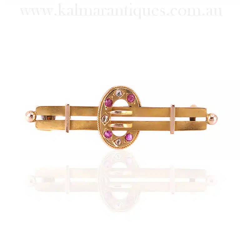 Antique ruby and diamond brooch made in 1896