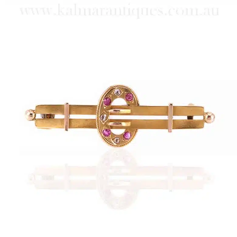 Antique ruby and diamond brooch made in 1896