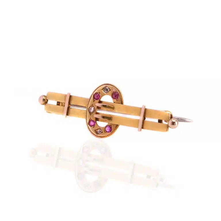 Antique ruby and diamond brooch made in 1896