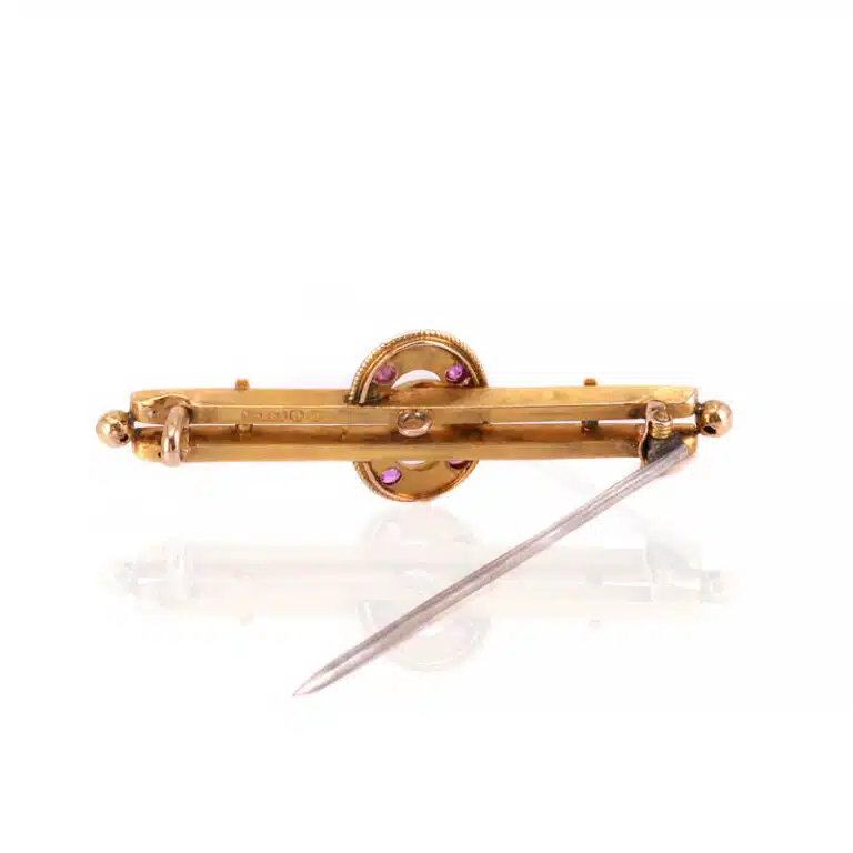 Antique ruby and diamond brooch made in 1896