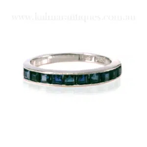 sapphire half eternity ring