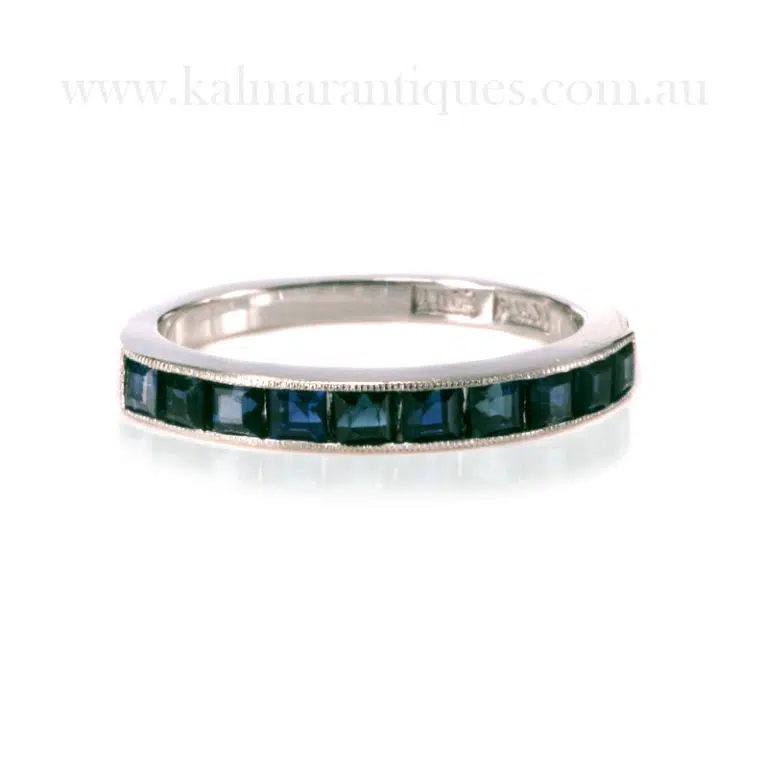 sapphire half eternity ring