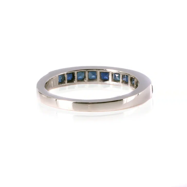 sapphire half eternity ring