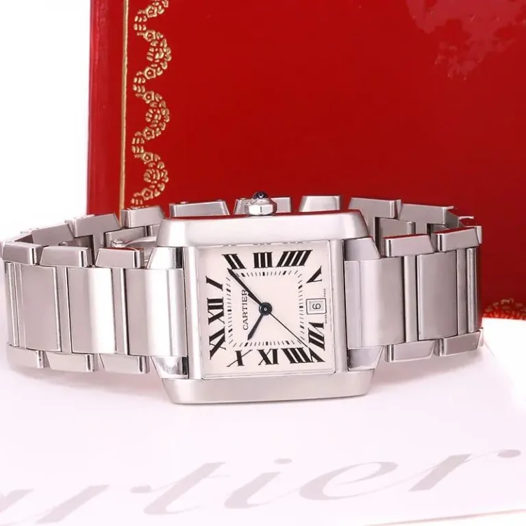 Structured Cartier Tank Française ladies watch featuring its iconic integrated metal link bracelet