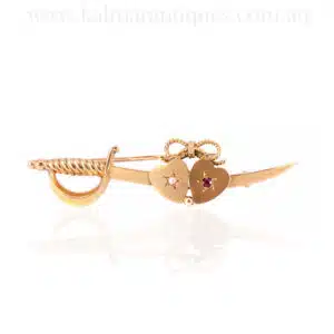 Antique ruby and pearl sword brooch