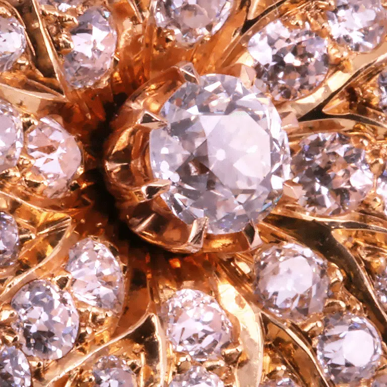 Diamond star burst brooch