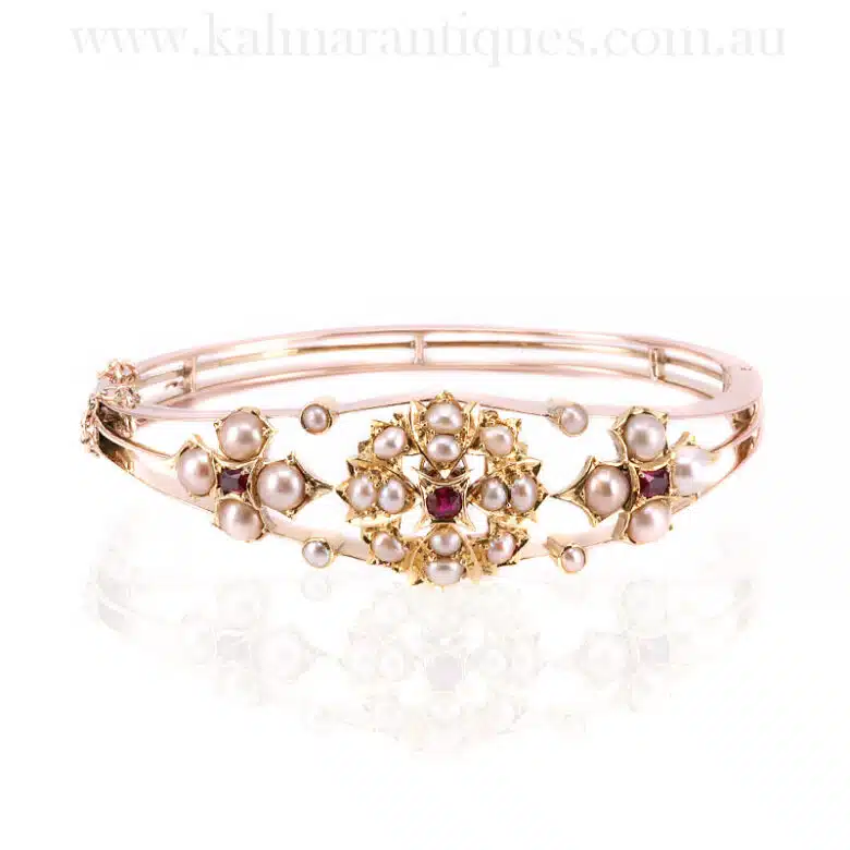 Antique ruby and pearl bangle made in 15 carat gold