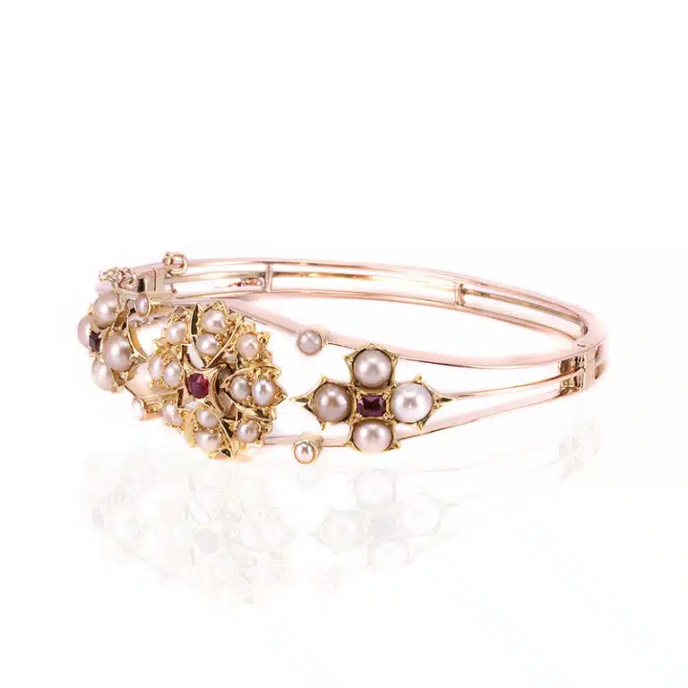 Antique ruby and pearl bangle made in 15 carat gold