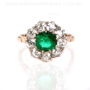 Antique emerald and diamond cluster ring