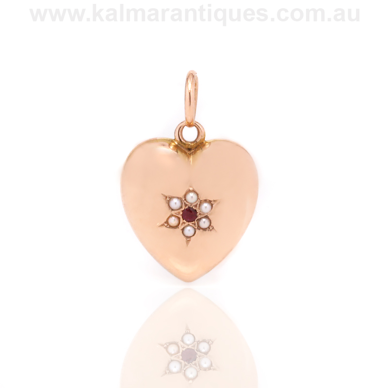 15ct rose gold heart locket with ruby 