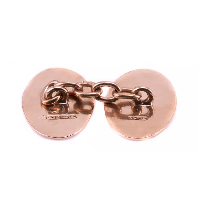 a close up of cufflinks