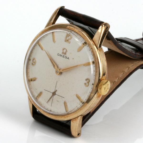 Buy Vintage 1961 Omega watch in gold 