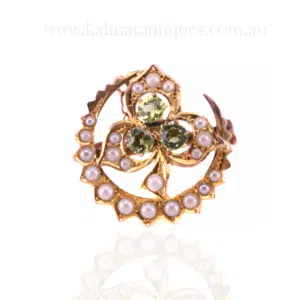 antique peridot and pearl brooch