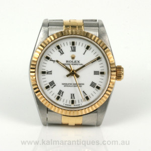 Midsize gold and steel Rolex model 67513