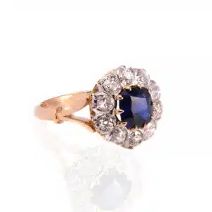 Sapphire and diamond halo engagement ring