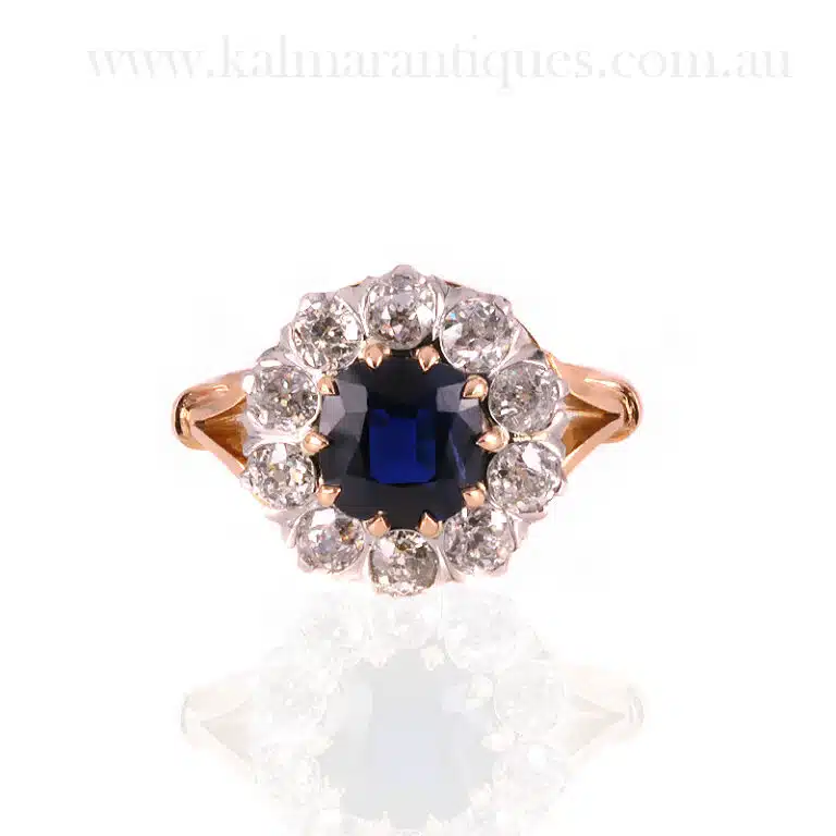 Sapphire and diamond halo engagement ring