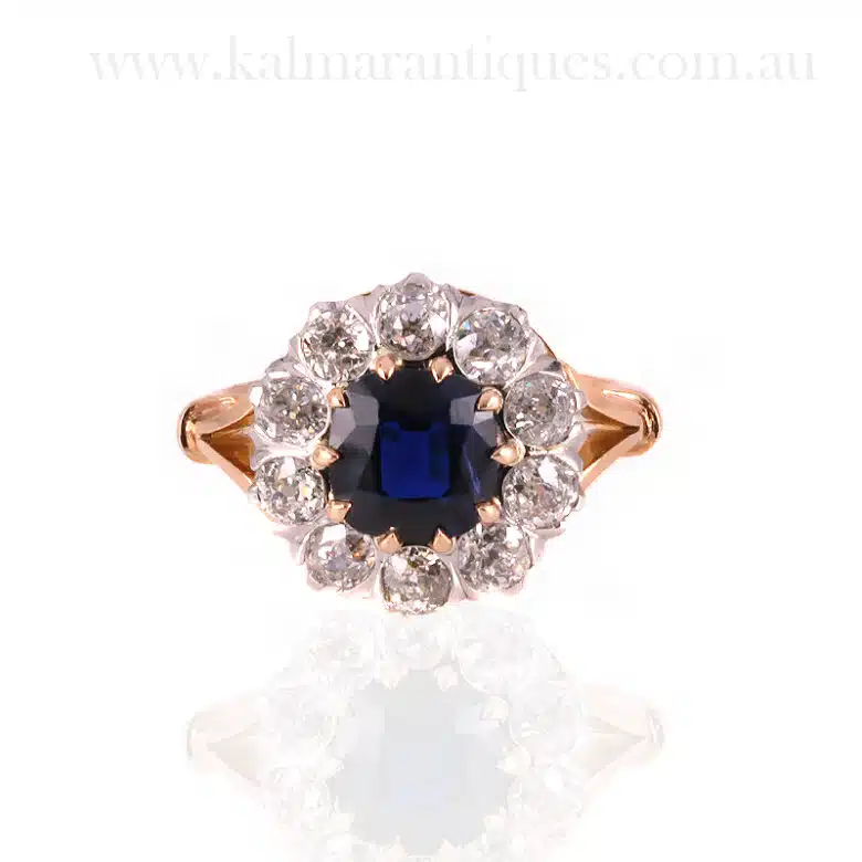 Sapphire and diamond halo engagement ring
