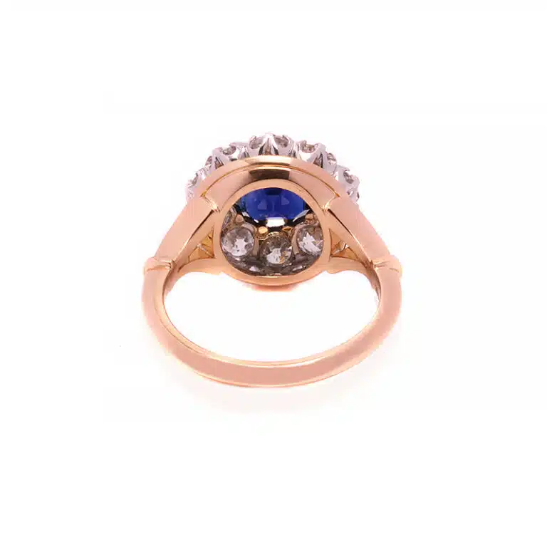 Sapphire and diamond halo engagement ring