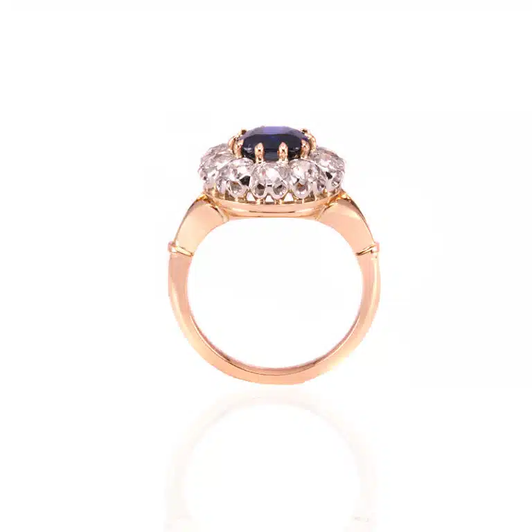 Sapphire and diamond halo engagement ring