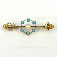 Antique turquoise and pearl brooch in 15ct gold.